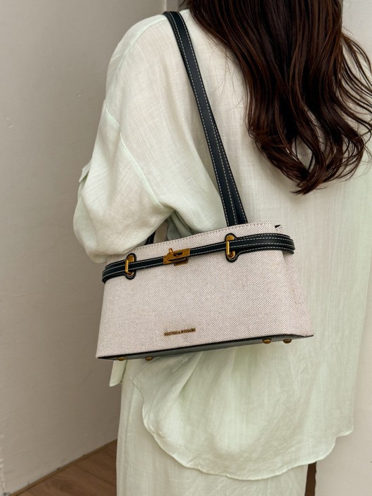 Textura de lino simple versátil alta sensación bolso de hombro de nicho para mujeres de diseño de viaje al trabajo bolsa de ocio