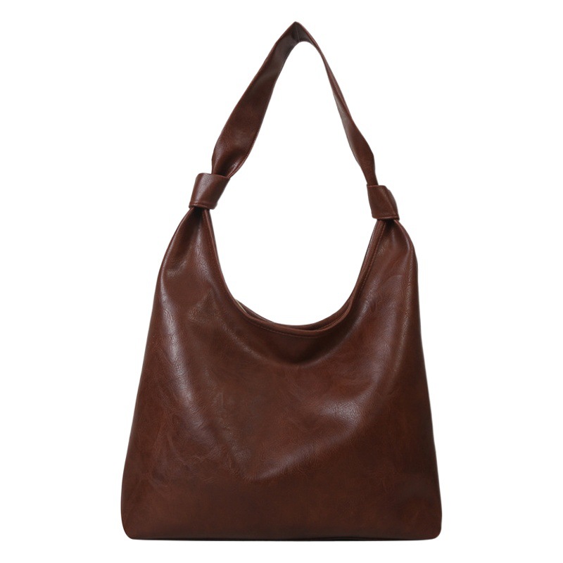 Moda europea y americana de alta textura retro bolsa de mujer 2023 invierno nuevo nicho diseño pu hombro bolsa de las axilas