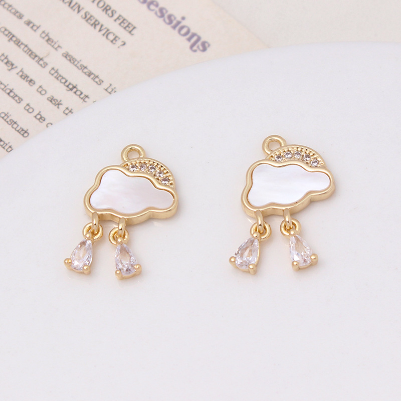 保色メッキ真金insは天然貝殻月の雲をはめ込んでいます。