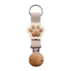 Apricot color (wooden hat clip with holes) off-white bottom edge (small paws)