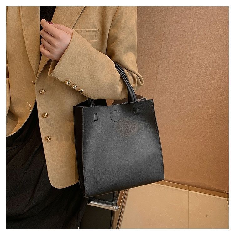 2024 New Bags Korean Version Versatile Commuting Bags Large Capacity Portable Tote Bag Temperament Popular Women’s Bag Vertical Style_voghion.com