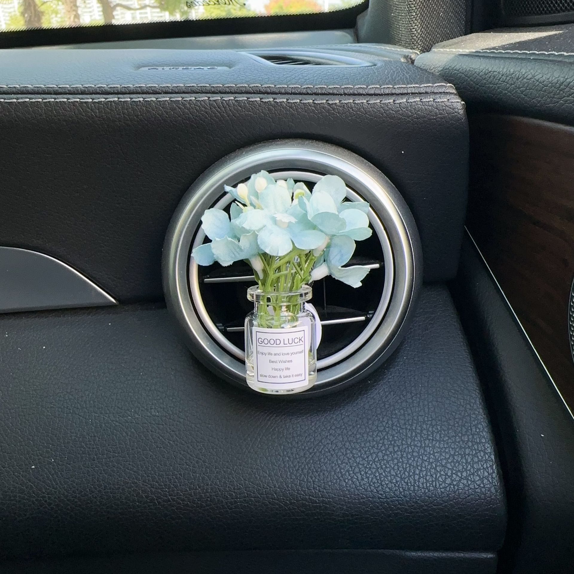 Decoración creativa de salida de aire del automóvil con flores de estrellas pequeñas frescas aire acondicionado botella de perfume de perfumes