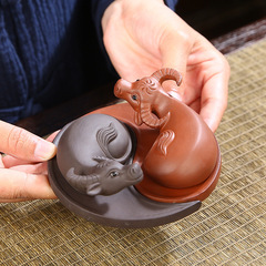 Tea pet figurine water buffalo turning the world upside down, detachable handcrafted tea art purple clay tea tray, wealth-bringing tea toy, tea ceremony nurturing.