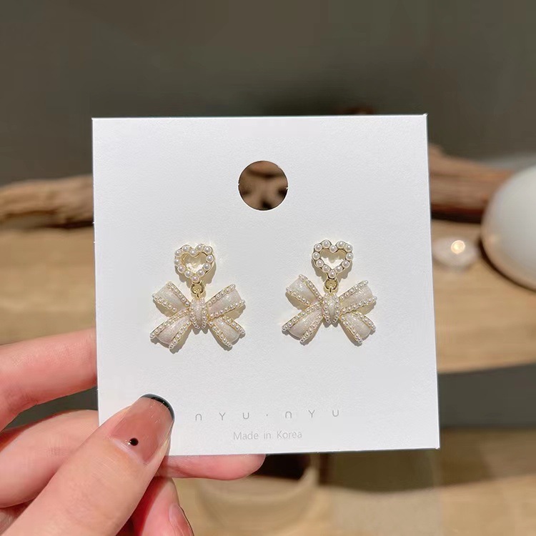 *Especiales* Pendientes coreanos de perlas con forma de corazón para mujer, diseño exclusivo, estilo de lujo ligero, pendientes de alta gama, venta al por mayor.