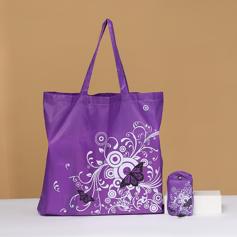 Bolsa de compras plegable de flores de mariposa Portátil Bolsa de protección ambiental en stock logotipo imprimible bolsa de almacenamiento de tela de poliéster Oxford