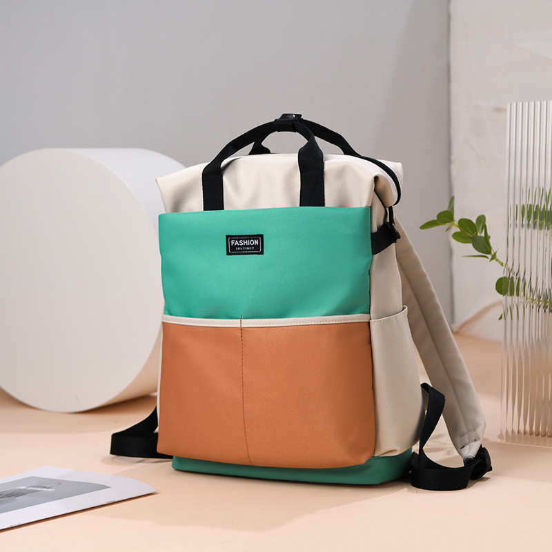 Bolso de mamá para madres y bebés de gran capacidad de estilo occidental, bolso de cercanías de almacenamiento de color en contraste de moda, mochila portátil multifuncional de un solo hombro