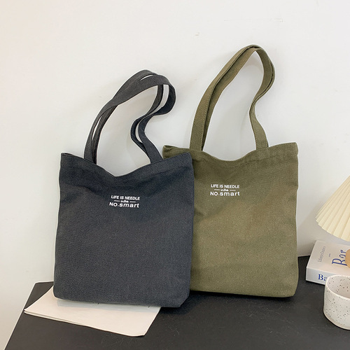 帆布包女文创国潮竖款斜挎包男生小背包ins单肩包学生风小包包