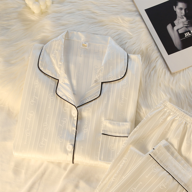 Pareja de pijamas de primavera y otoño de seda de hielo de manga larga de las mujeres a rayas de alto sentido de los nuevos hombres de seda real desgaste del hogar traje de verano