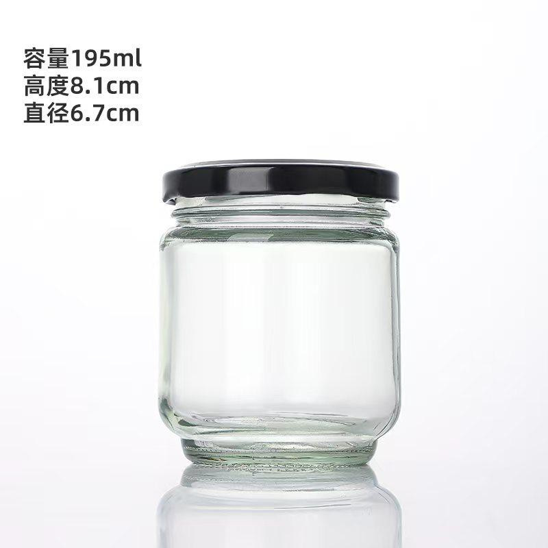 Botella de vidrio al por mayor botella vacía de grado alimenticio hervir botella de conservación de miel mermelada botella de hongos shiitake