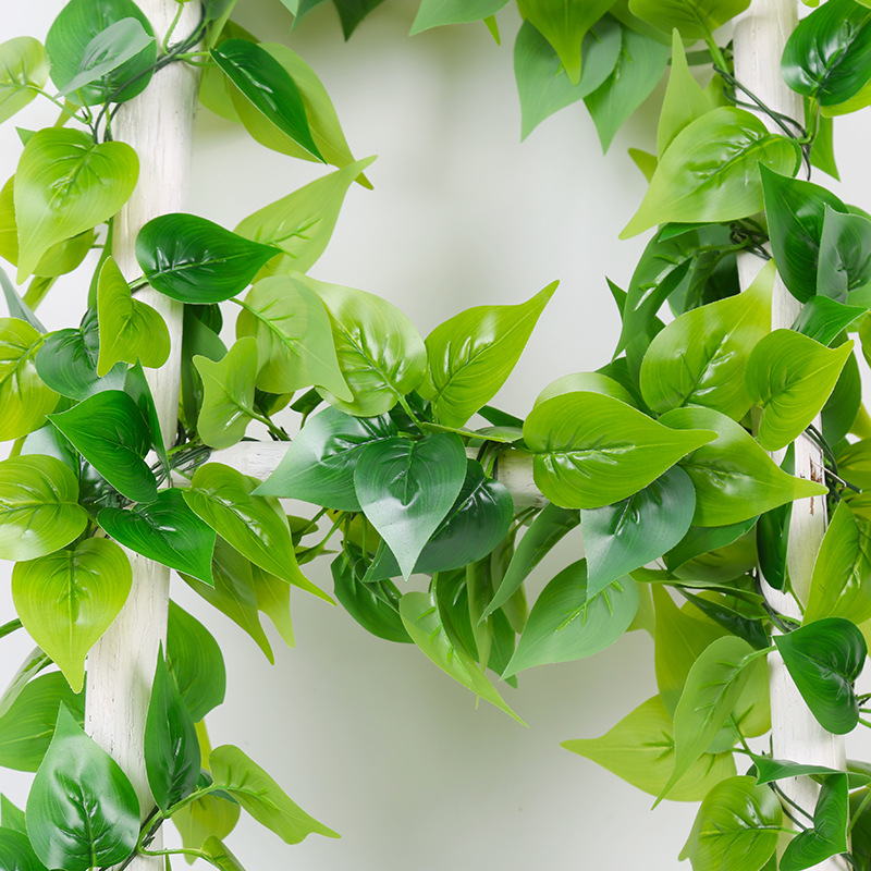 Simulated green radish leaves and rattan decoration, fake leaves, green vines and vines for heating water pipes to block air conditioners and wrap plastic flowers