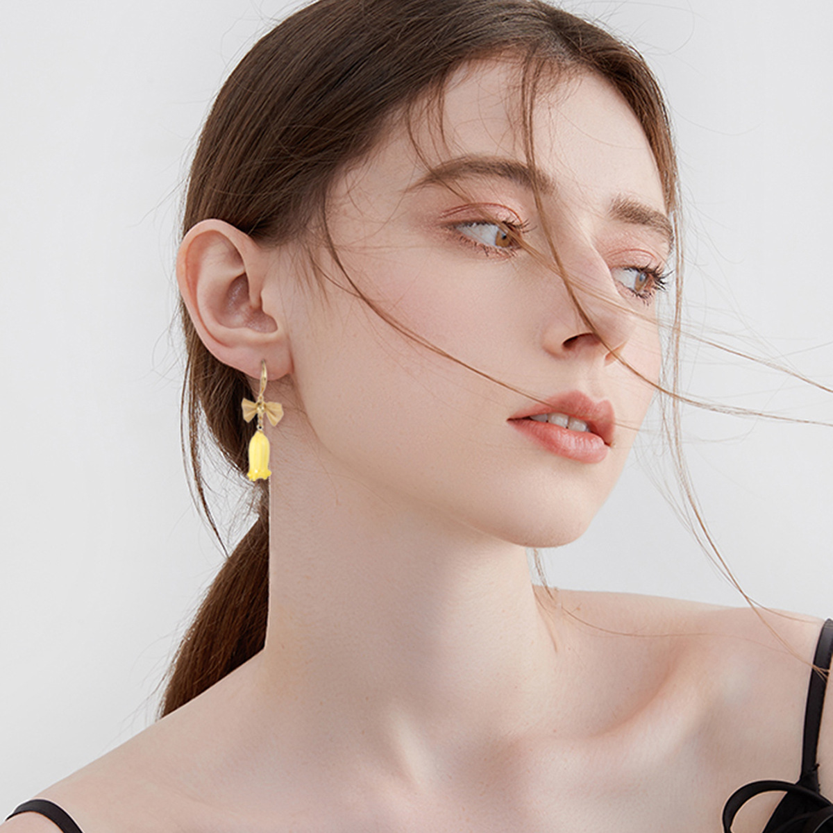 Yellow earrings, orchid
