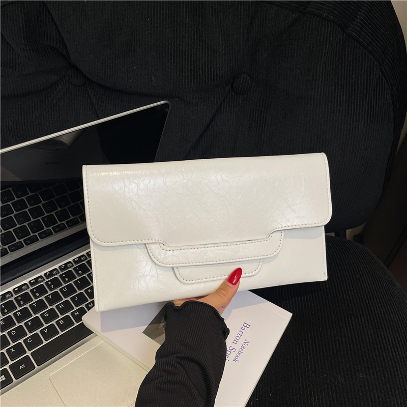 Bolso de mujer de color sólido bolso de cambio de mujer bolso de mano de alto valor de cara simple bolso corto de moda bolsa de sobres versátil