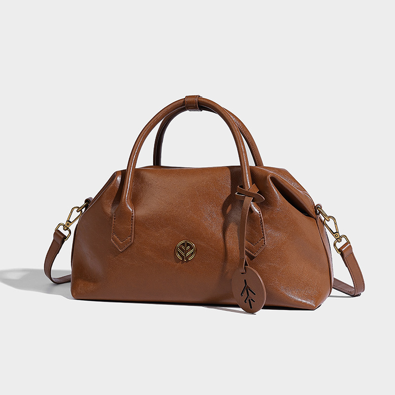 Bolsos de Boston de piel bronceada vegetal retro bolsos de bolera portátiles bolsos de mujer otoño e invierno 2024 nuevos bolsos de Usnea de hombro único