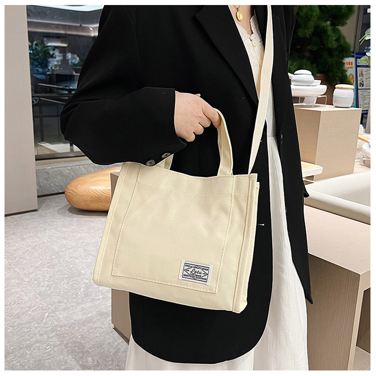 257g Weight Polyester Lining Material Sewing Thread Fashion Element Zipper Closure Type Single Shoulder Strap, Top Handle Strap Type Square Bag Bags Type Casual Occasion Canvas Material Solid Color Pattern All Seasons Season Women's Gender Streetwear Style Square Shape Women's Canvas Solid Color Streetwear Sewing Thread Square Zipper Square Bag 22