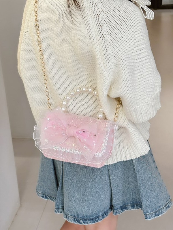 Nuevo bolso infantil de moda de otoño bolso de mochila para chicas bolso portátil de perlas princesa pequeña fragancia bolso de cambio al por mayor