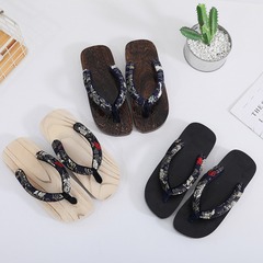 メーカーの卸売りの丸い頭の平と日本の人の字は新型のカップルの日本の角度の下駄の人の字と引きずることができます。