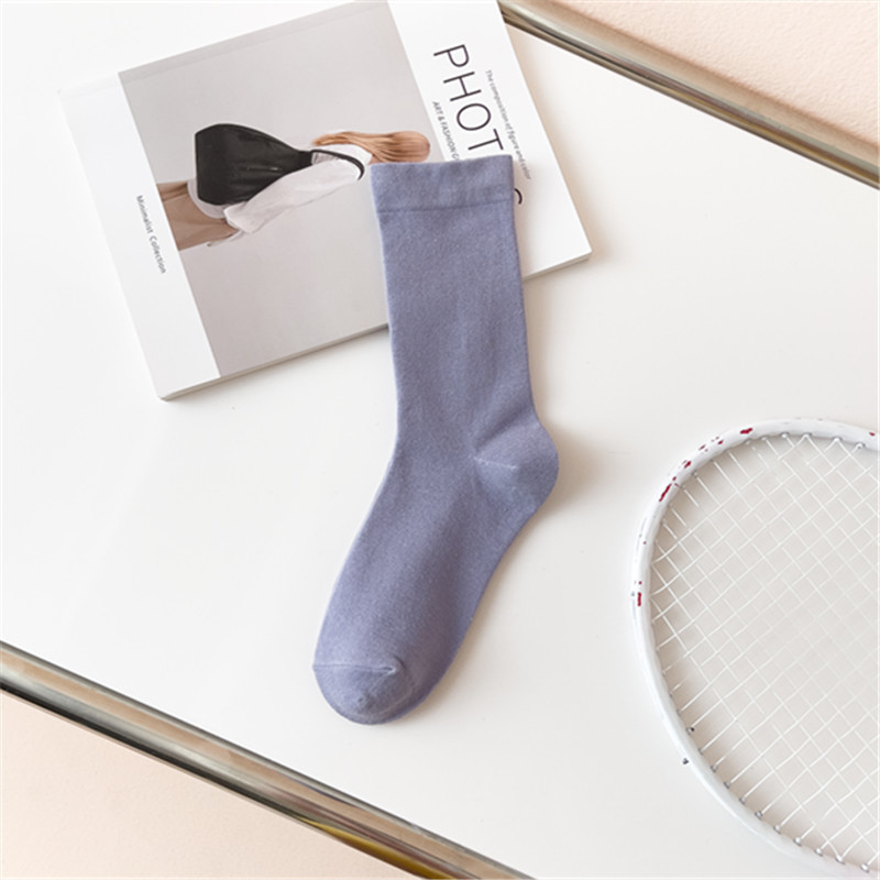 Calcetines de color sólido calcetines de confinamiento de boca suelta de algodón calcetines de pila de media pantorrilla para mujeres al por mayor calcetines de algodón largos transpirables de estilo japonés