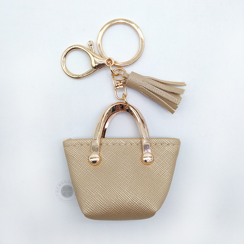 Llavero para mujer, bolso, colgante, joyería, mini monedero de almacenamiento de cuero lindo europeo y americano