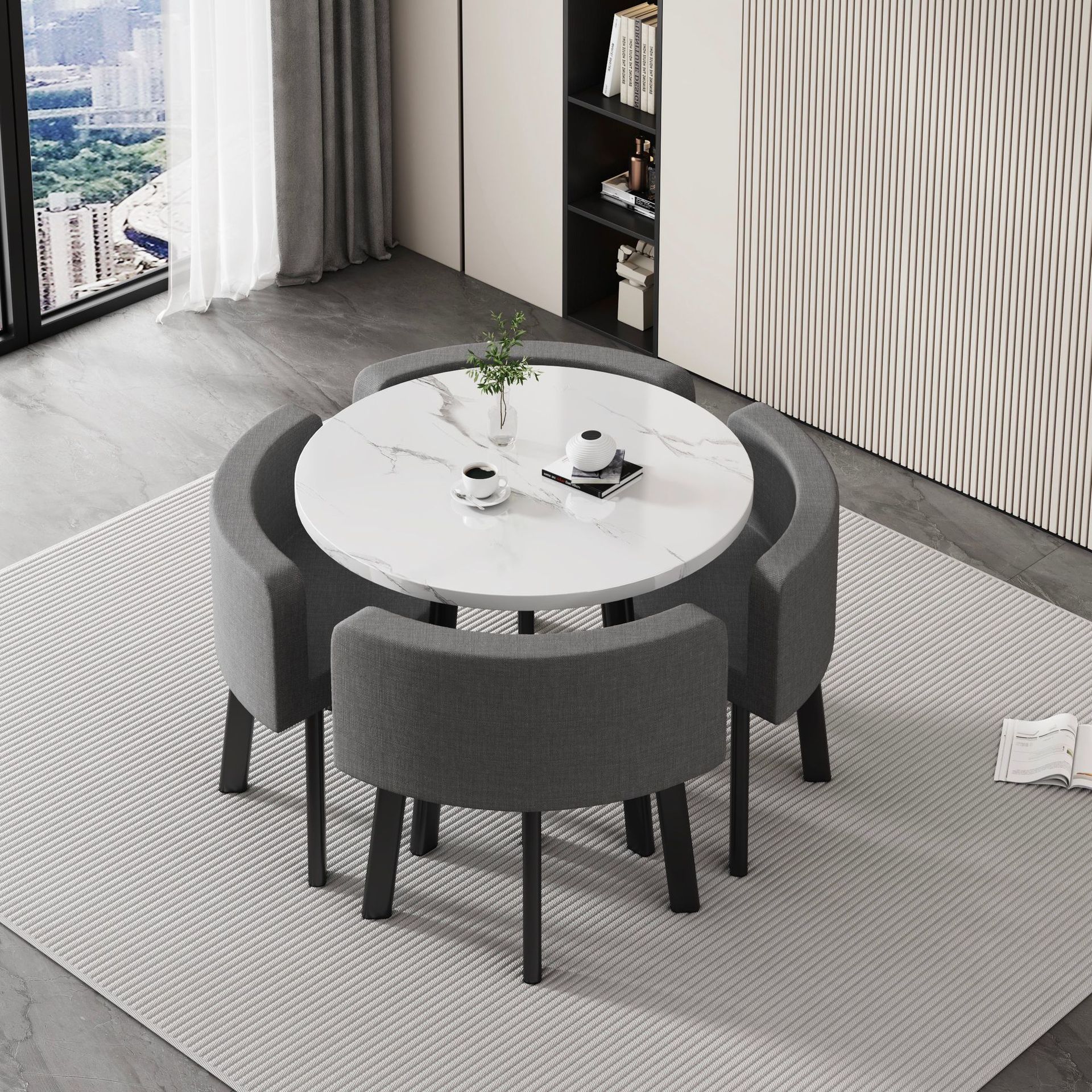 White round table + four gray cloth chairs