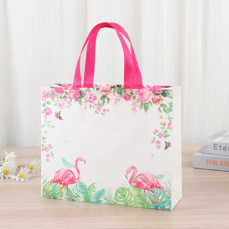 Bolsa de mano no tejida multi-especificación plegable con regalo de mano bolsas de compras de mano logotipo impresa en color bolsas de tela no tejida