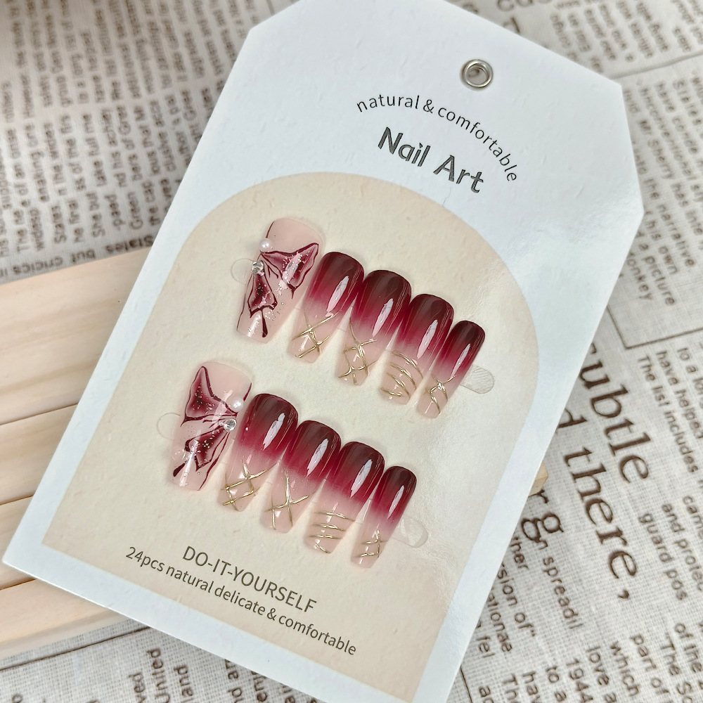 Arte de uñas al por mayor para Año Nuevo, arte de uñas hecho a mano con tendencia nacional roja del Año de la Serpiente, pegatinas de uñas con efecto ojo de gato y fuegos artificiales con un toque de alta gama.