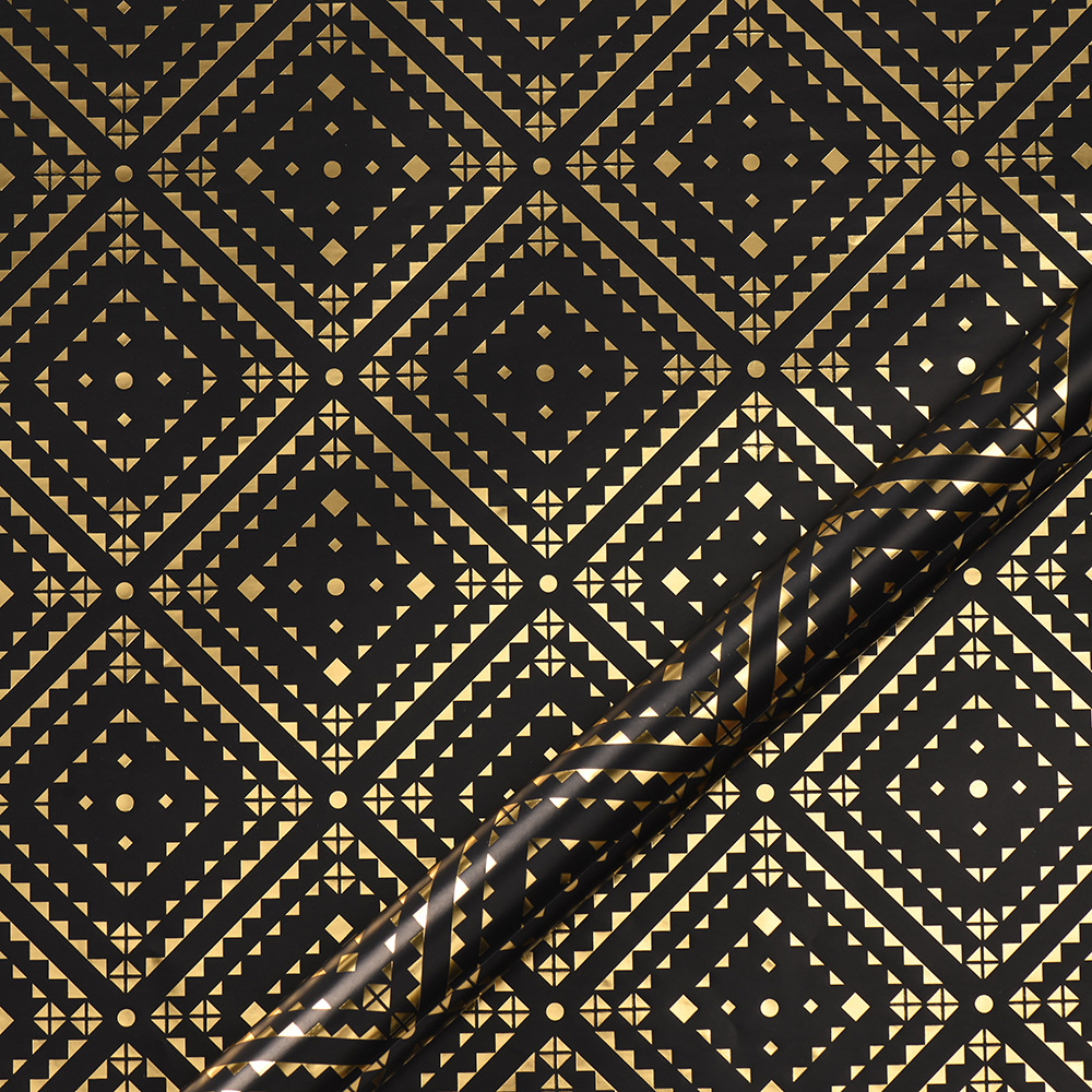 Nuevo papel de embalaje de caja de regalo grueso fondo negro estampado dorado estrella puntos rayas de papel de embalaje de regalo roll