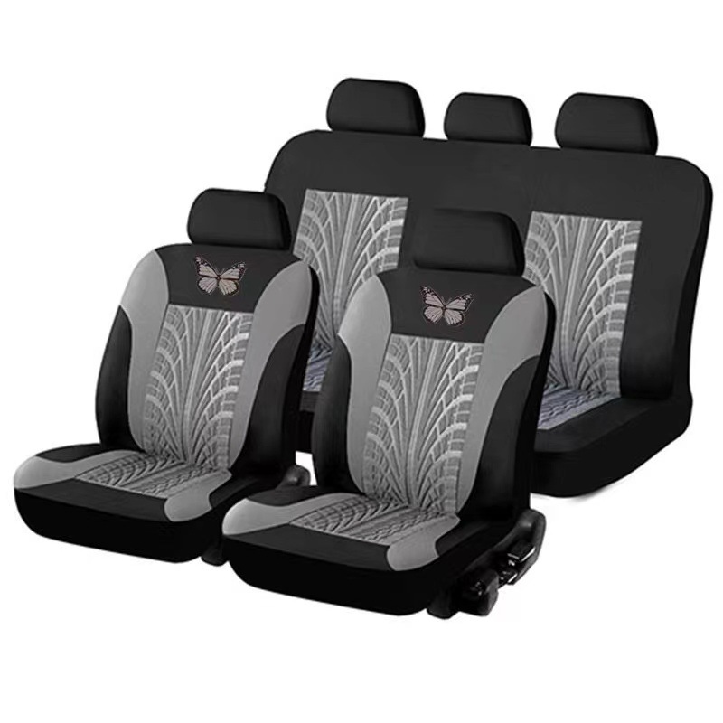 Cubierta de asiento de coche de comercio exterior transfronterizo mariposa logo tela sangría prensa cubierta de asiento universal de coche conjunto de 9 piezas