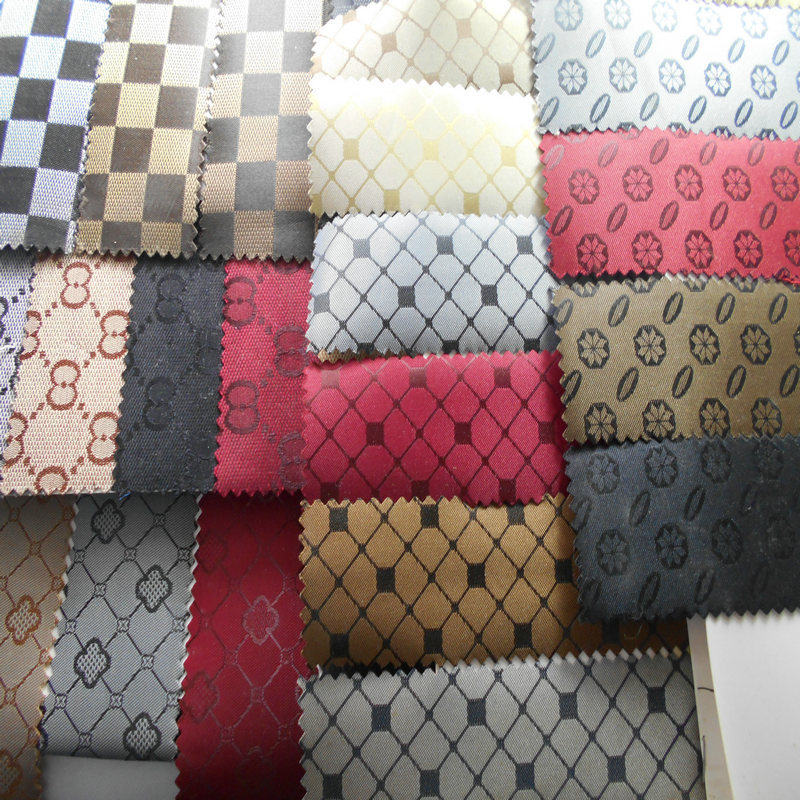新款牛津布提花豹纹发泡 涤纶色织提花方格格仔涂层PVc发泡布面料