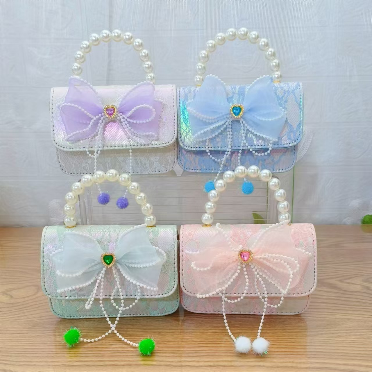Bolsa de arco princesa bolso de perlas bolso de mano cadena bolso de cinturón pequeño viento bolso de niñas bolso de regalo del día de los niños bolso pequeño