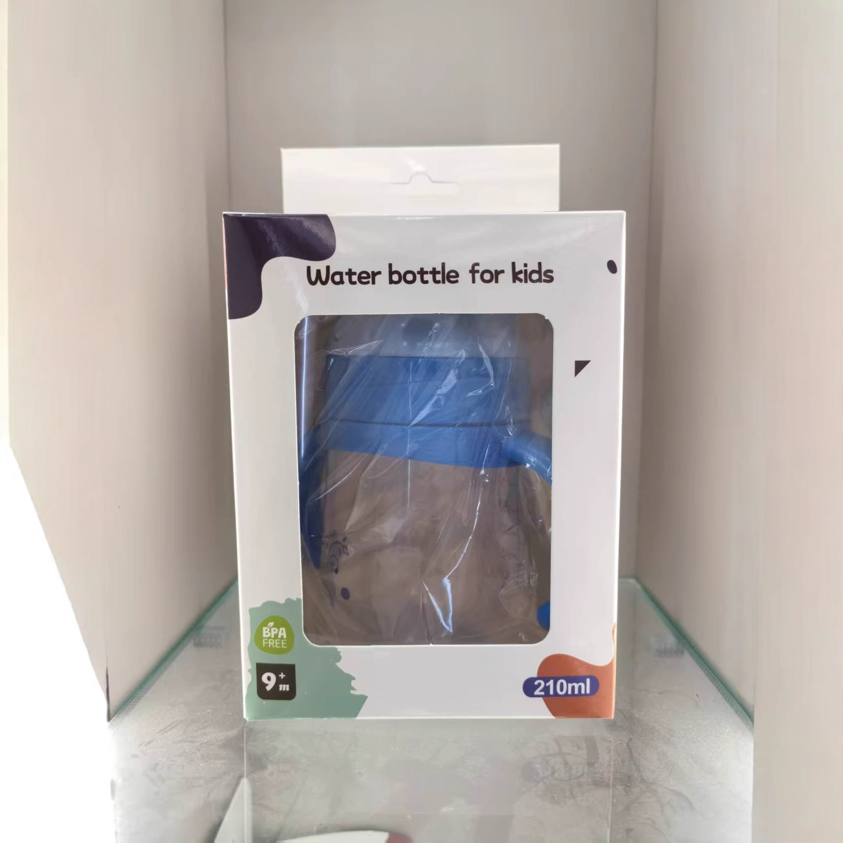 Inglés caja de dibujos animados bebés taza de bebida PP anti-caída taza de agua a prueba de fugas con mango gorra de boca de pato taza de bebida directa al por mayor