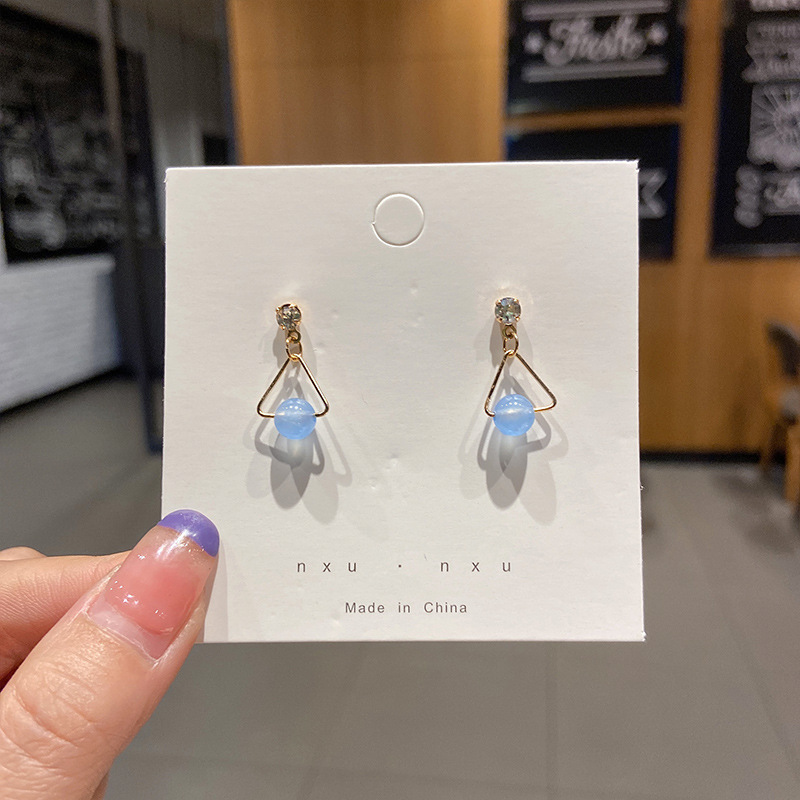 20 # Perla azul triangular-