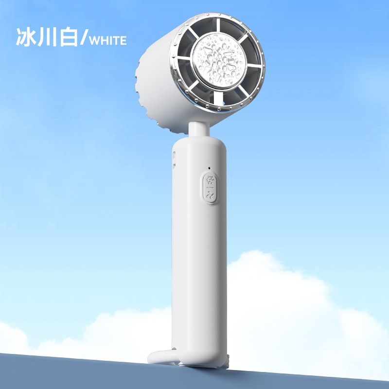 2025 nuevo ventilador pequeño portátil de mano con compresa de hielo mini ventilador de refrigeración silencioso de escritorio de carga USB pequeño