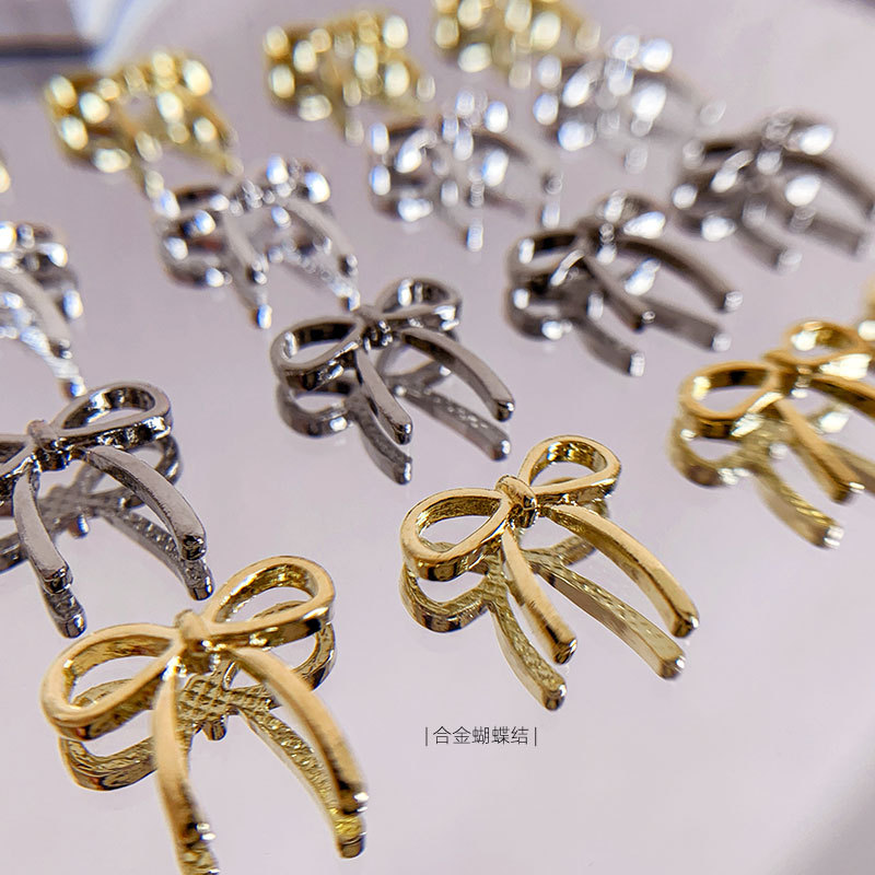 Golden nail decoration with bow, accessories, internet celebrity, new collection 2