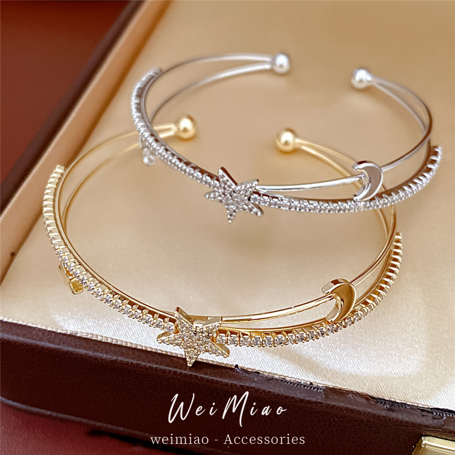 El oro real, la estrella de piedra, la luna, la doble abertura cruzada, la pulsera de personalidad, la pulsera de nicho, el lujo ligero