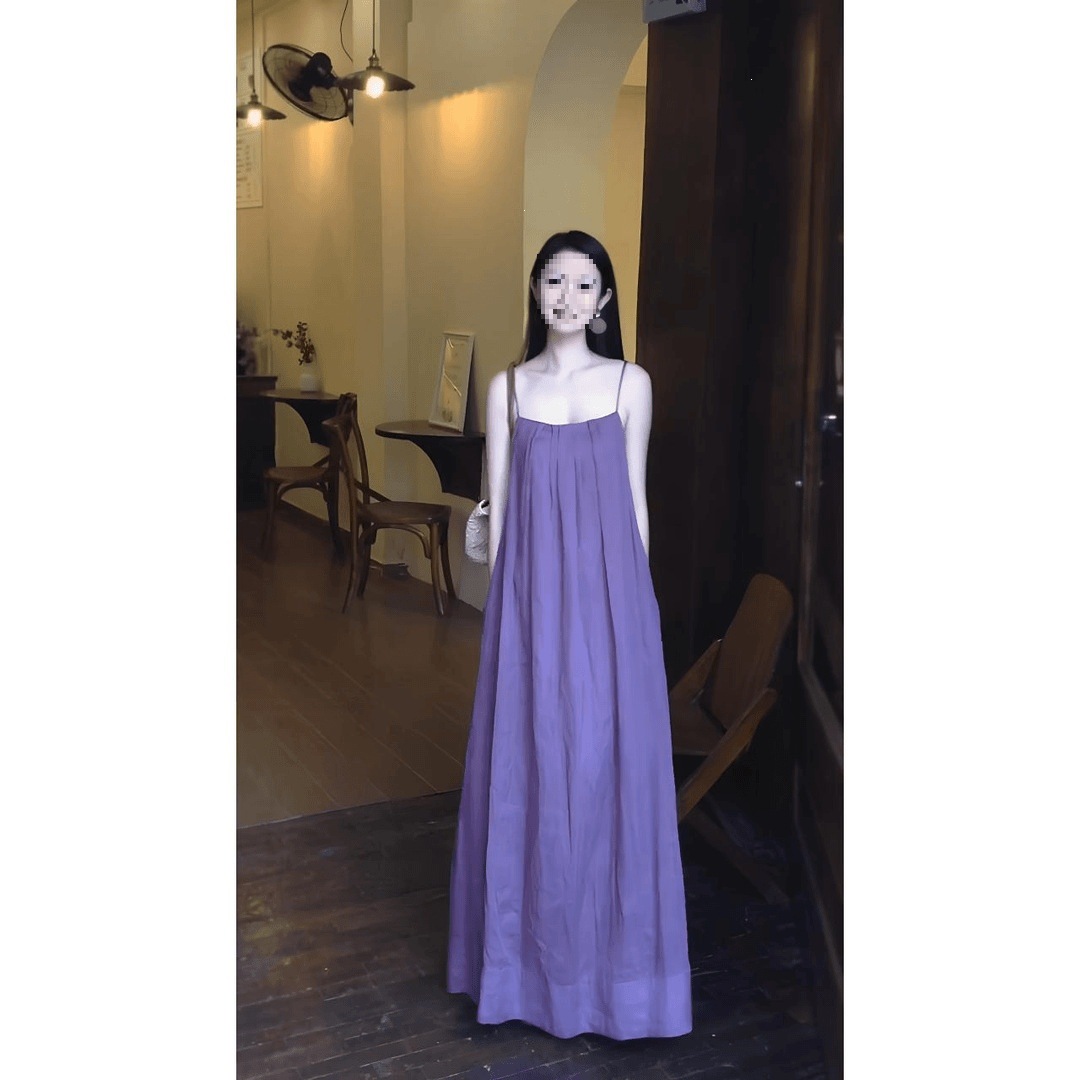 紫色无袖吊带连衣裙女2026夏季新款海边度假风宽松显大摆中长裙