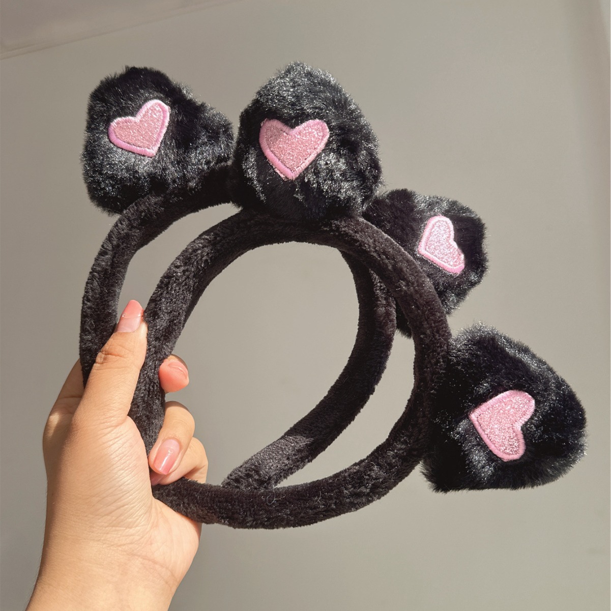 Plush black headband heart shaped for face washing