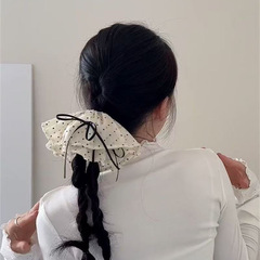 新しいフランスのレトロな波点の蝶結びのリボンの髪輪の馬尾の団子の頭は髪のひもを刺して皮の筋の女性を飾ります。