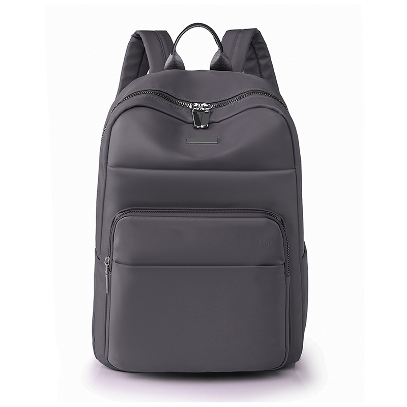 2023 nueva mochila de nailon casual para mujer, simple viaje de negocios, mochila para computadora de gran capacidad, mochila escolar al por mayor