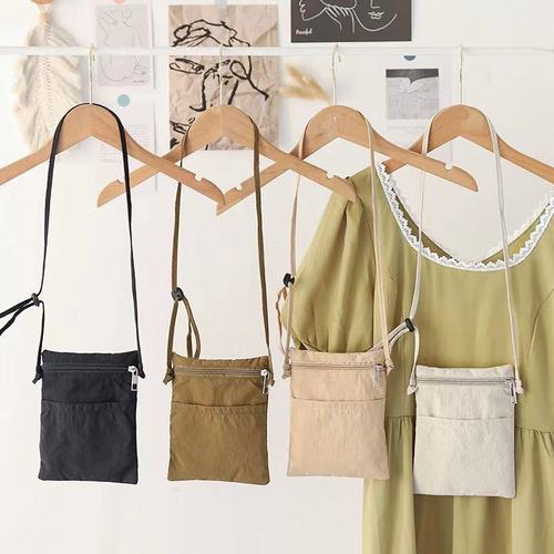 New Japanese-style casual nylon mobile phone bag for women—trendy, versatile, perfect for shopping; lightweight and stylish shoulder/crossbody option.