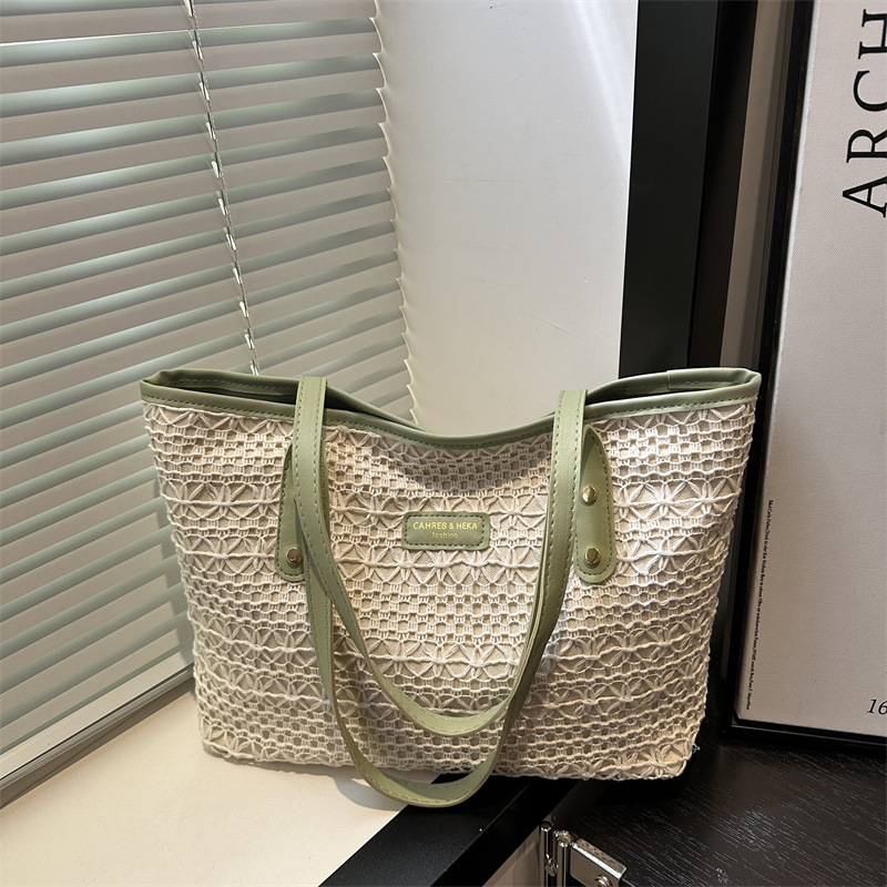 Bolso de moda de gran capacidad tejido 2025 verano de alto valor salvaje bolso de axila de un solo hombro bolso de mujer
