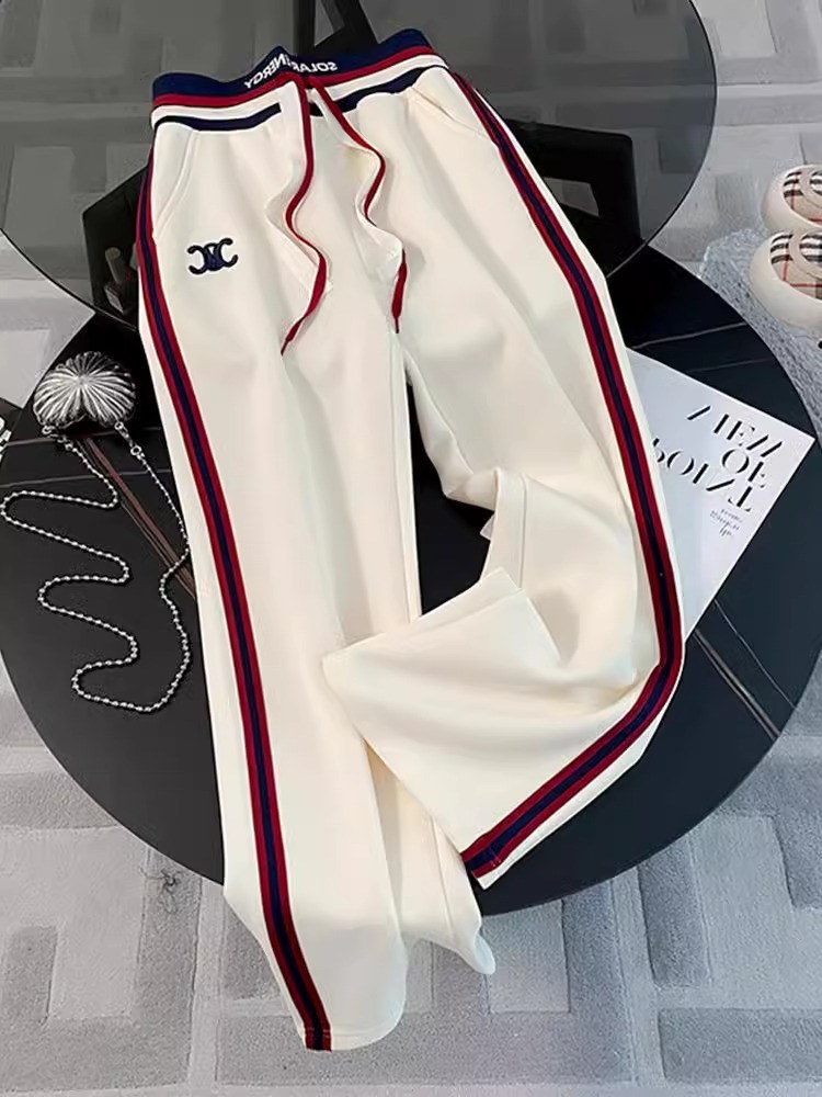 ハイエンドのレジャースポーツスーツの女性の春の2024の新型の流行のヨーロッパの商品は帽子のガードルのストレートなズボンの2つのセットをつないでいます。