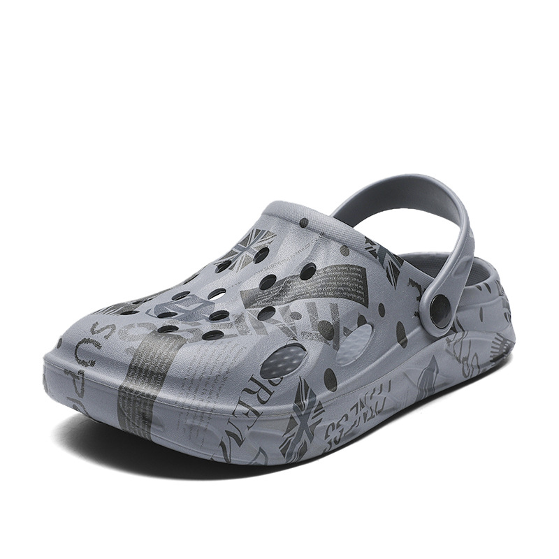 Los grandes fabricantes de Fujian zapatos con agujeros para hombres en la playa de verano 2025 nueva marca de moda perezosa plataforma de suela gruesa sandalias Baotou