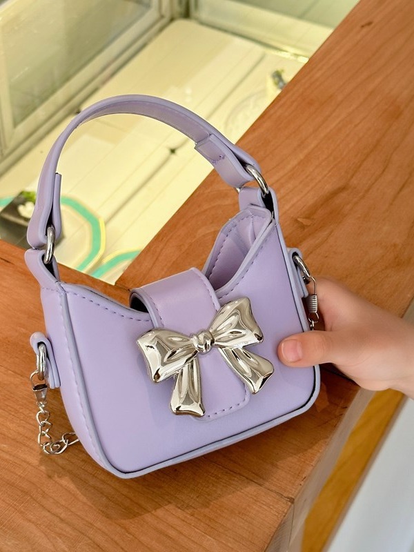 Bolso para niños 2024 nuevo estilo color caramelo arco mini bolso para niñas cadena para padres e hijos bolso de mensajero sobre rojo