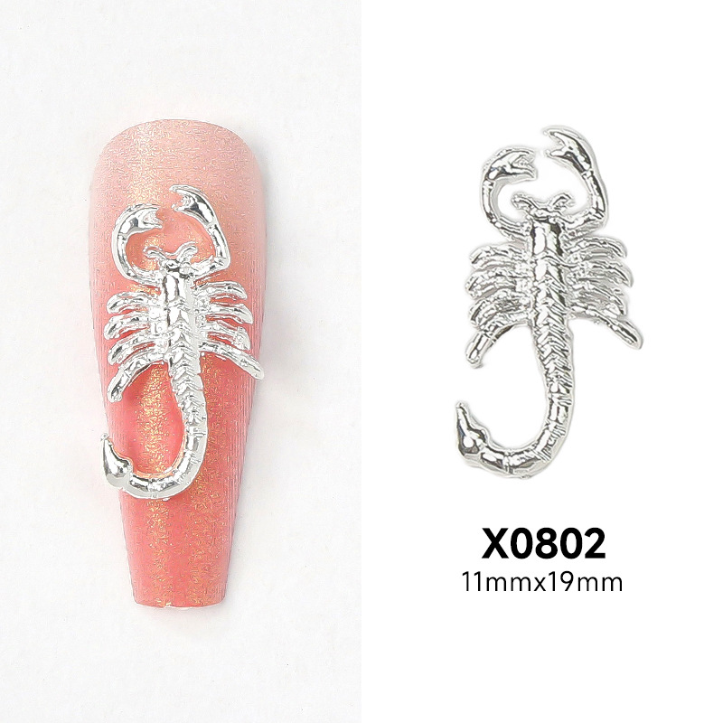 Nueva joyería de uñas de aleación de escorpión transfronteriza pistola de oro y plata pegatina de uñas negro tridimensional estatua de Buda joyería de uñas al por mayor