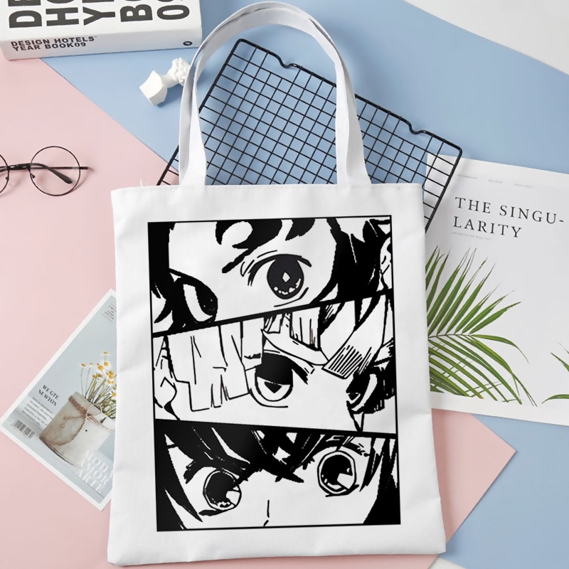 Comercio exterior transfronterizo Demon Slayer impresa bolsa de lona Harjuku bolsa de hombro bolsa de compras portátil de moda para estudiantes