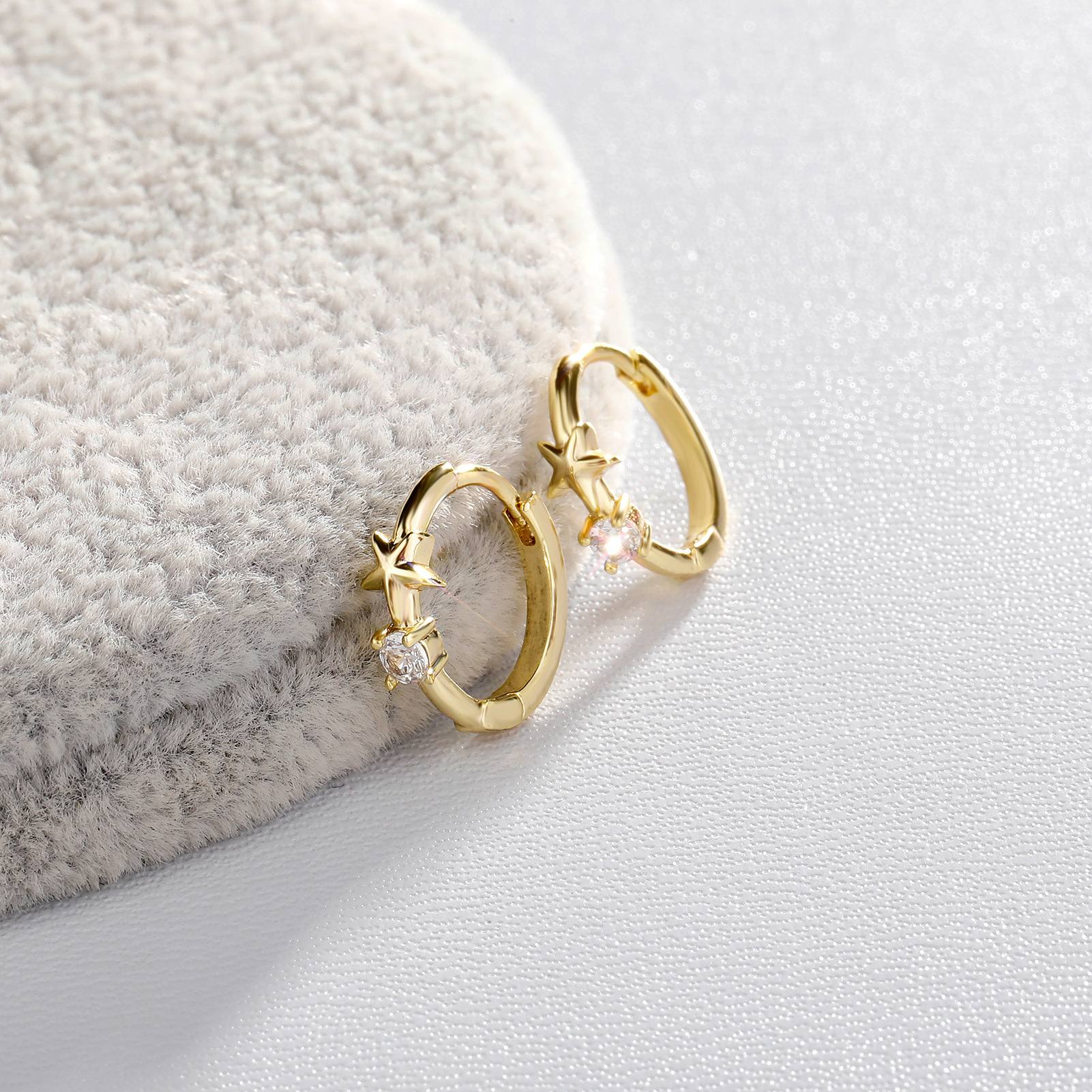 small design golden earrings for men and women with zircon