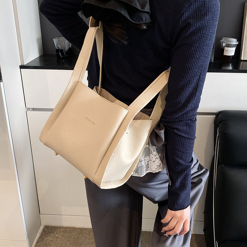 Bolso de cesta de verduras portátil más vendido transfronterizo para mujer 2025 nuevo bolso de mensajero versátil de alta gama bolso de cubo simple casual