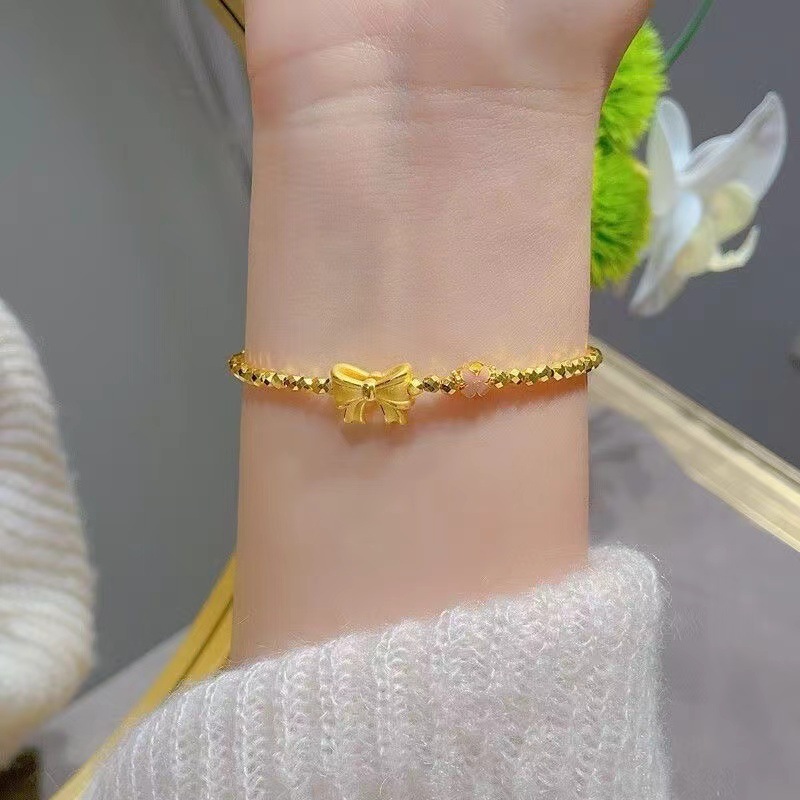 精緻古法黃金色蝴蝶結桃花蹦迪手鍊女新款簡約爆閃珠手串