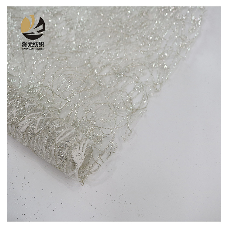 Fabricantes promocionales de bajo precio blanco polvo bordado esquinilla hilo de encaje de plata pulverizado oro vestido de boda tela