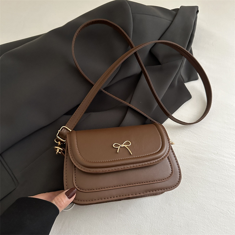 Bolso de lazo coreano para mujer 2025 primavera y verano nuevo bolso de silla simple de moda bolso de mensajero de hombro literario de moda